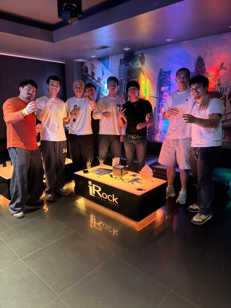 Team toasting in a private room at iRock